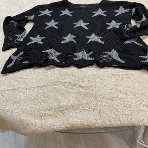 Sweater with Stars and frayed bottom